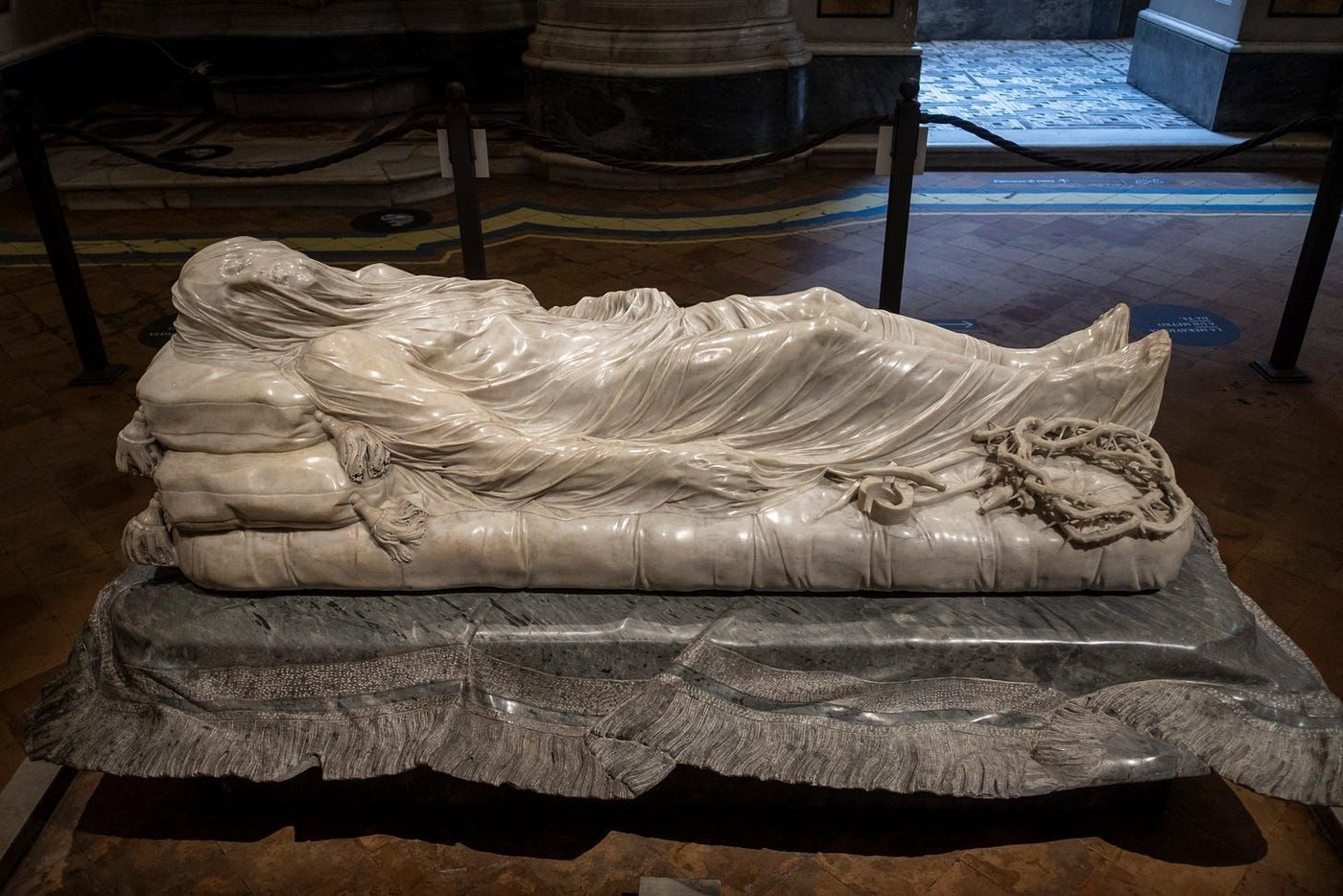 Giuseppe Sanmartino, Veiled Christ, 1753: a marble figure of the dead Christ lying on cushions beneath a thin carved veil, with the crown of thorns and pincers at his feet